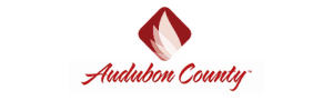 Audubon County logo depicting a stylized bird in flight.